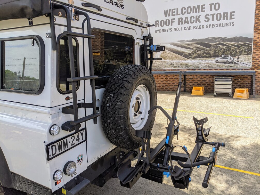 Landrover Defender With Rockymounts BackStage Swing Out Hitch Mounted Bike Carrier