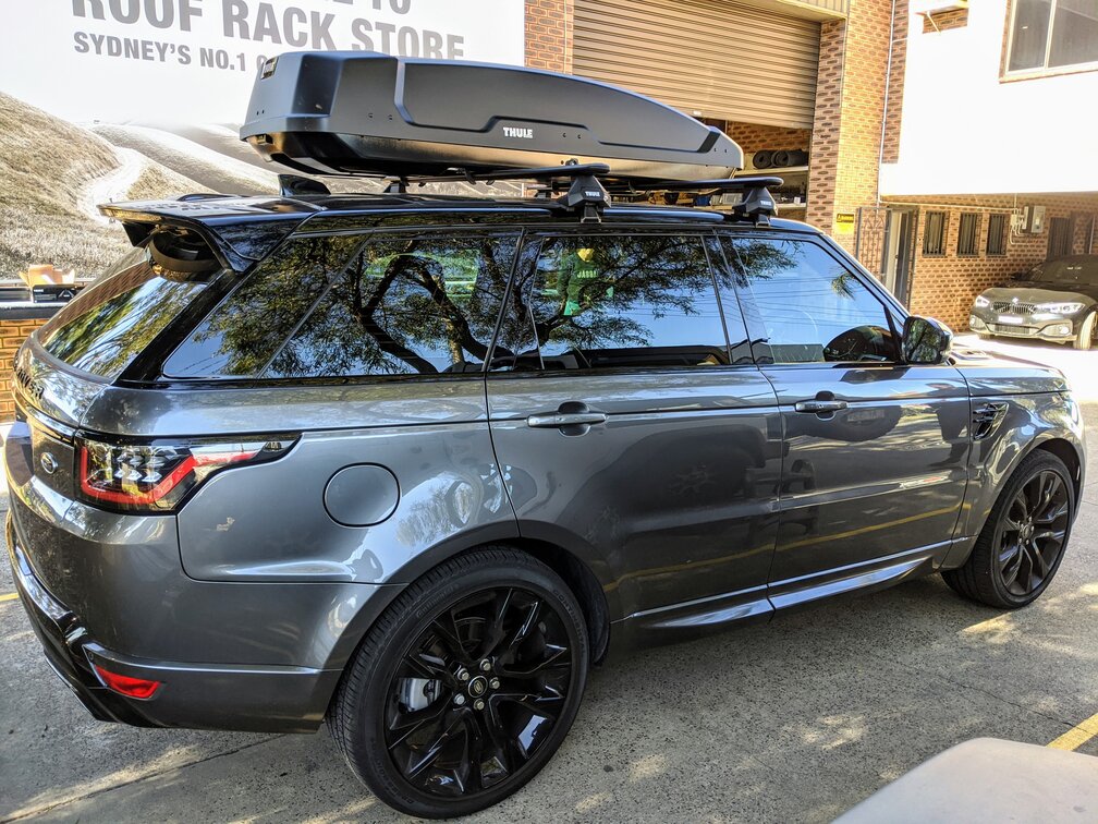 Range Rover Sport With Thule Force XL Roof Box On Thule Evo Roof Rack
